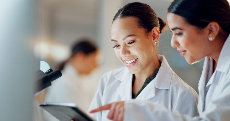 Women scientists analyzing test results